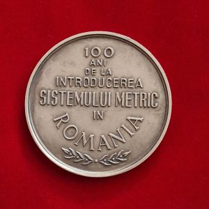 Placheta 100 de ani de la introducerea sistemului metric în România